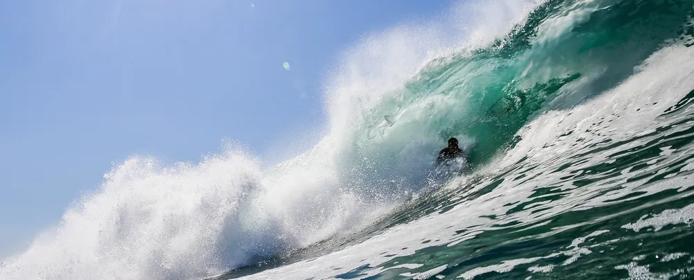 Why Are People So Drawn To The Thrill Of Riding The Waves?
